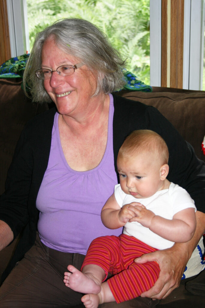 Home Visit Volunteer with baby and mom