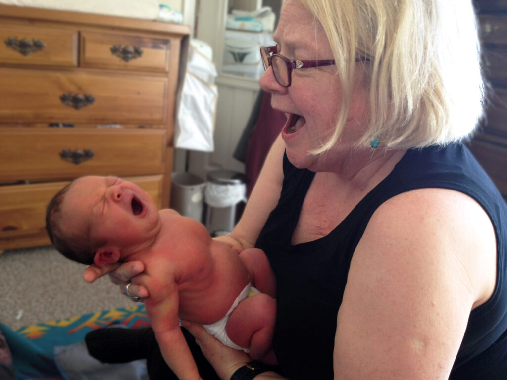 Home Visit Volunteer with baby